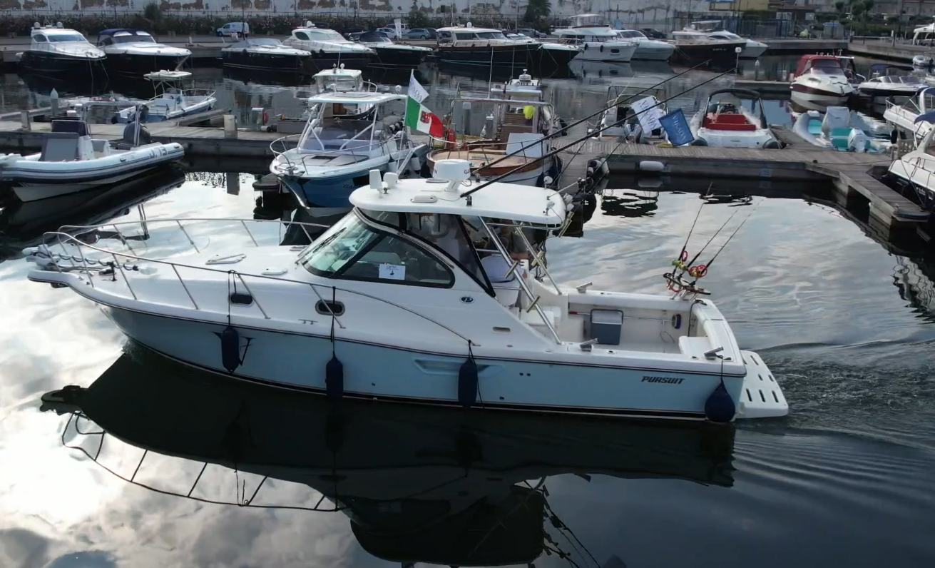 Pursuit 3100 Offshore in the marina