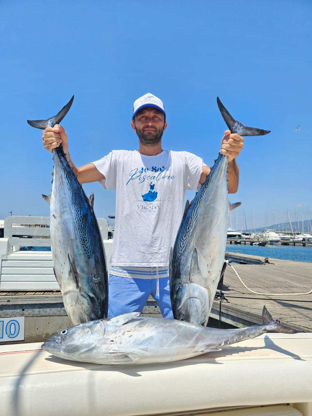 A proud catch at the dock